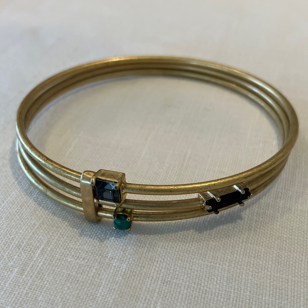 Elegant Gold Bangle Bracelet with Gem Accents